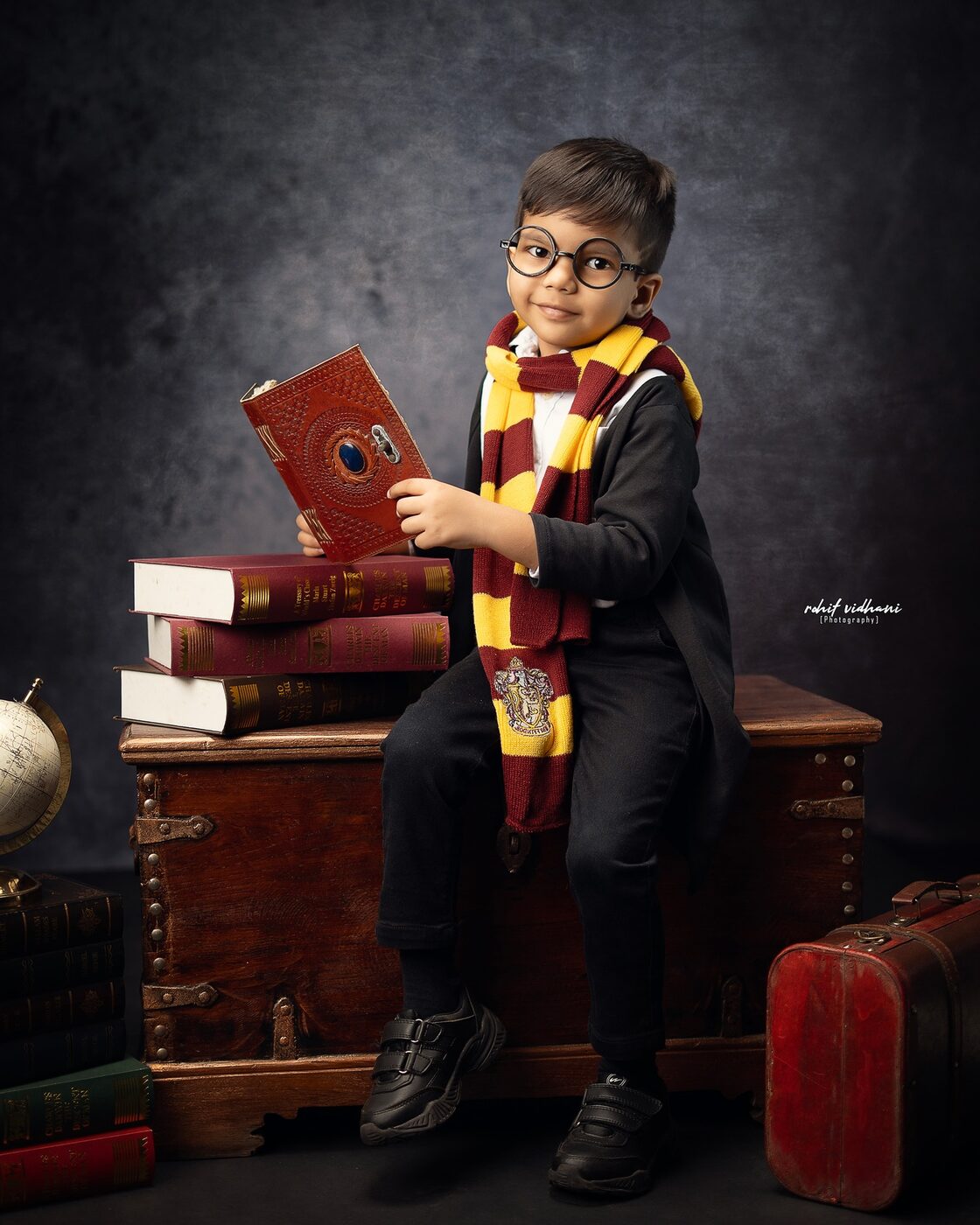 Kids Harry Potter themed portrait, close up with book